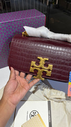 Quilted croc patterned sling bag