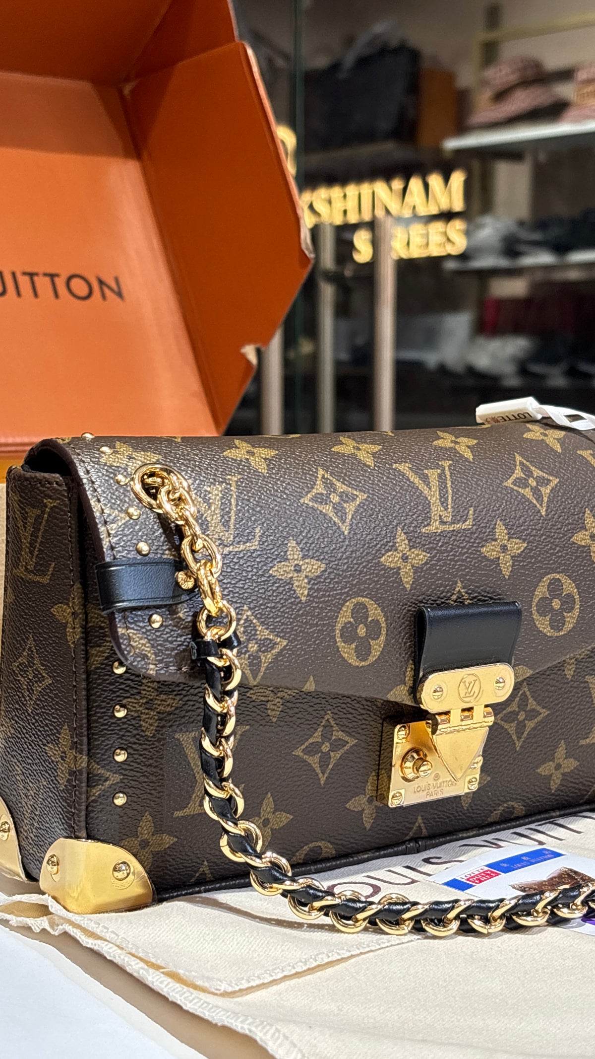 Signature monogram sling bag