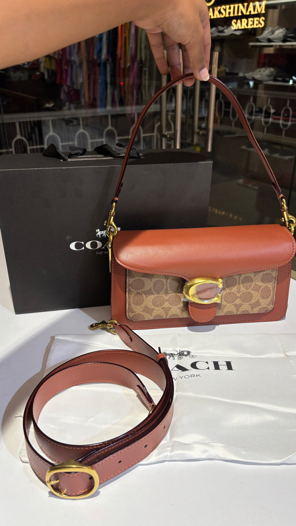 Signature monogram tan tabby bag