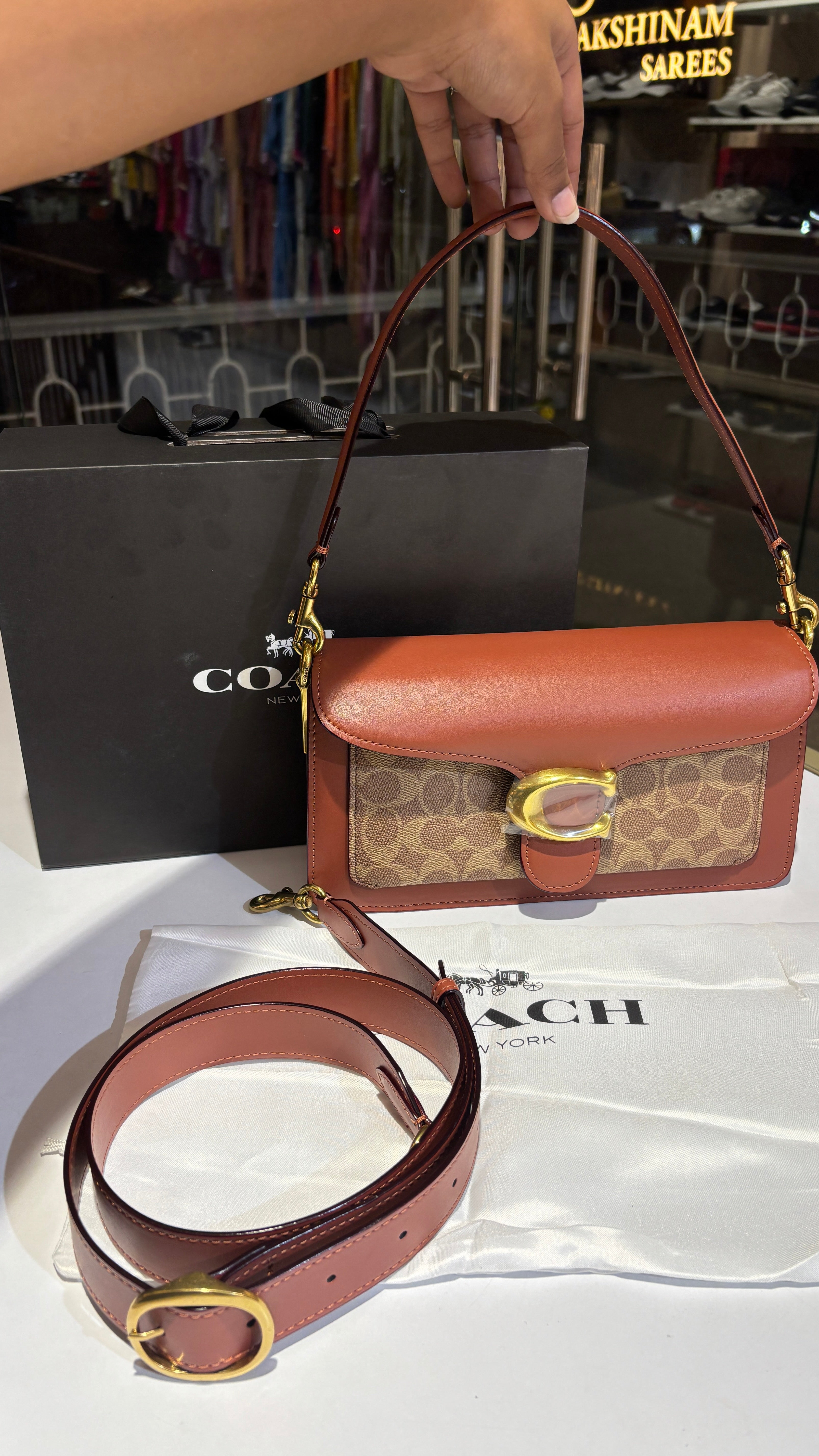 Signature monogram tan tabby bag