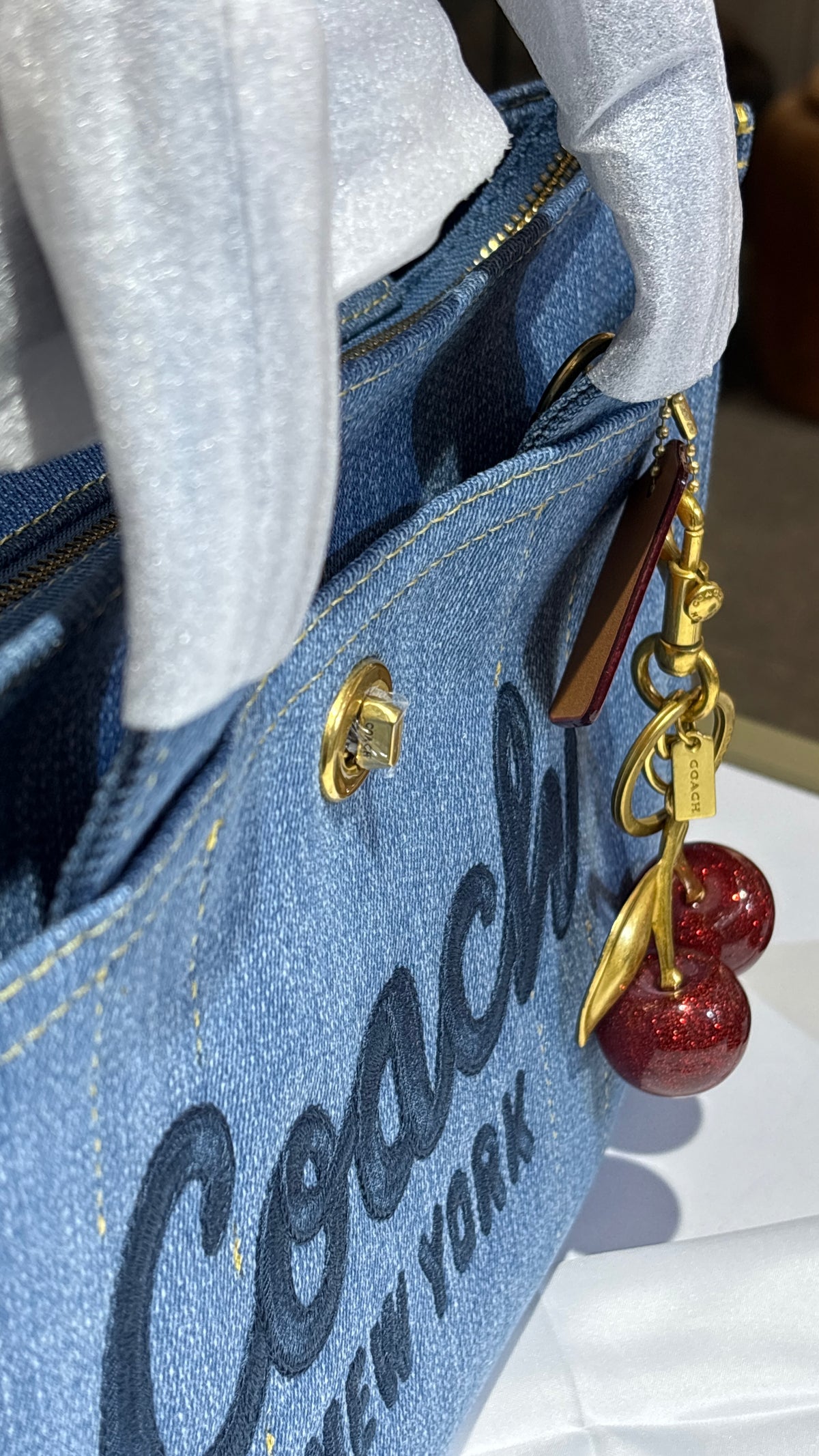 Structured denim bag with cherry charm
