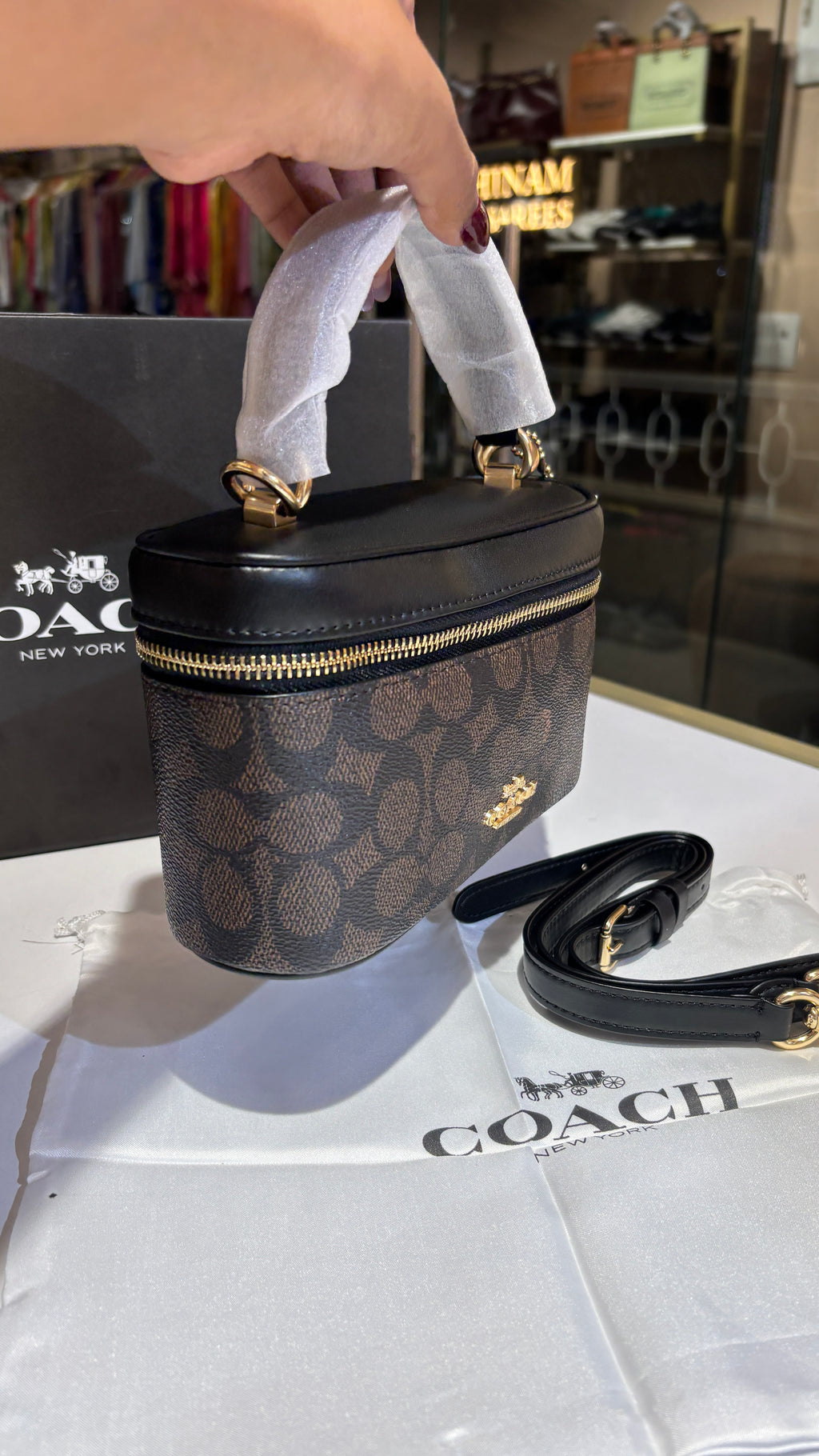 Dark brown monogram vanity bag