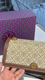 Signature monogram canvas crossbody bag