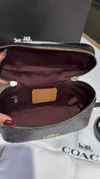 Dark brown monogram vanity bag