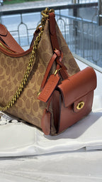Signature monogram versatile bag with 3 slings