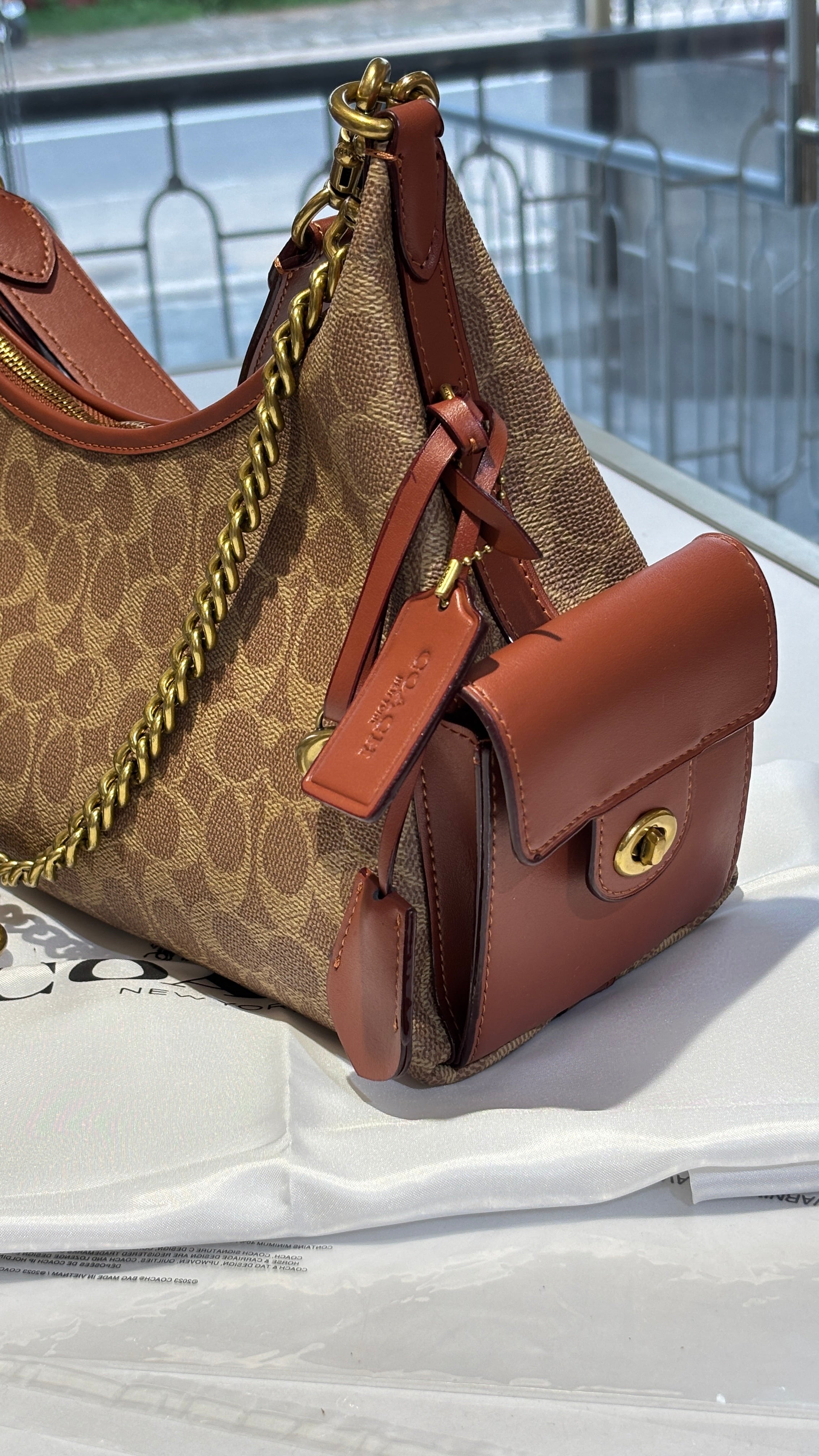Signature monogram versatile bag with 3 slings