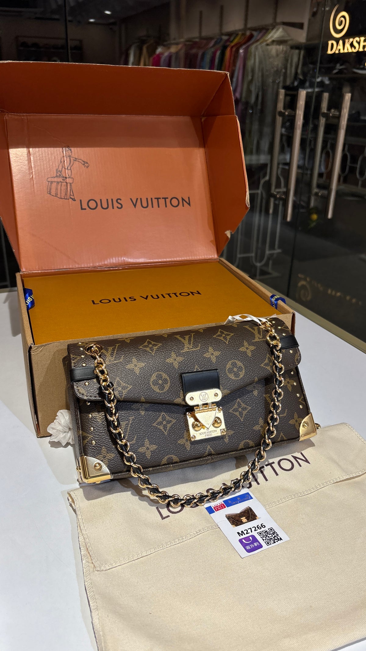 Signature monogram sling bag