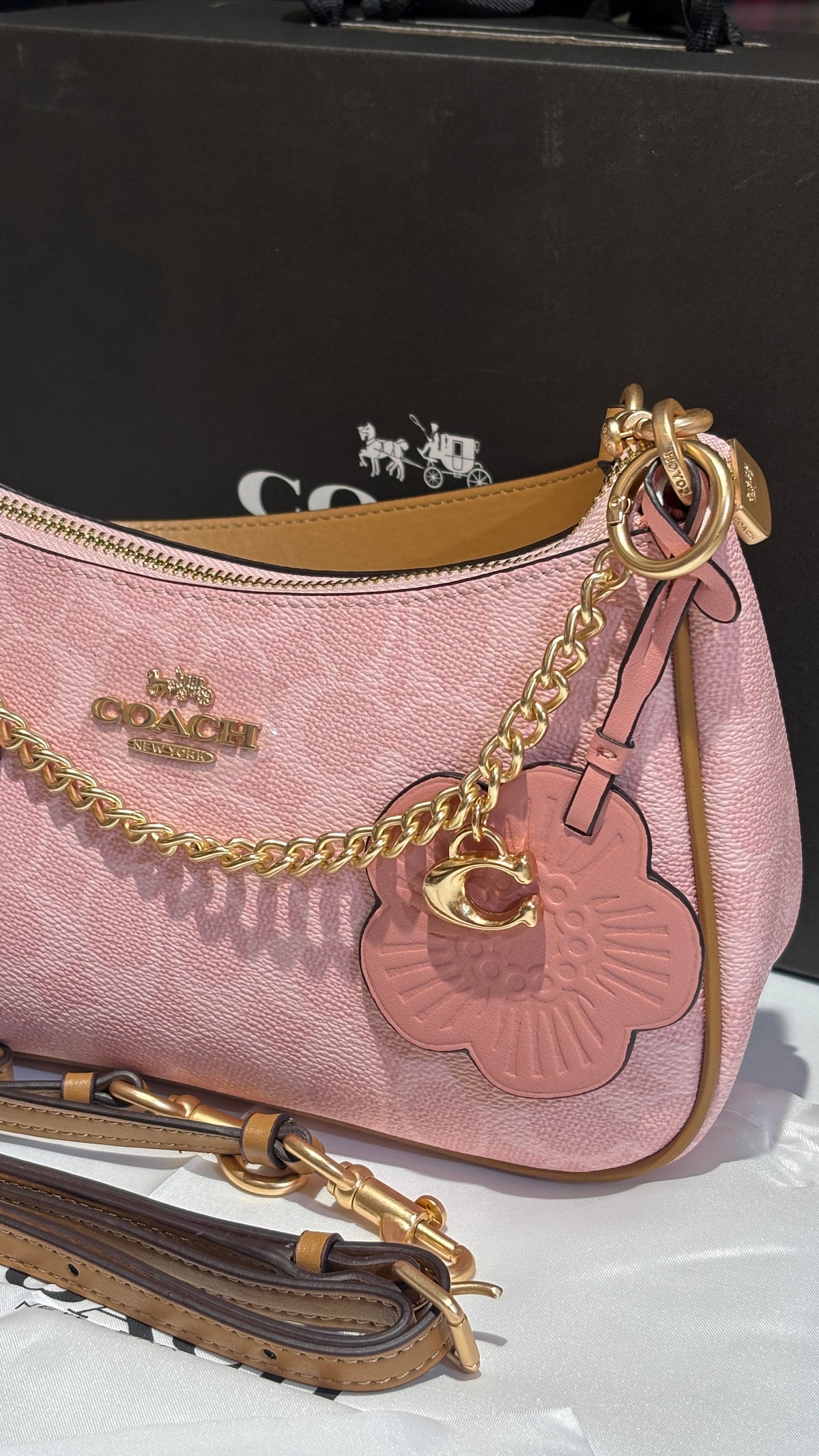 Signature monogram pink shoulder bag with charms