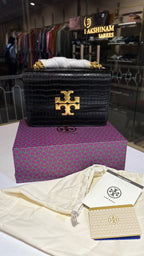 Quilted croc patterned sling bag