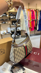 Signature monogram leather shoulder bag