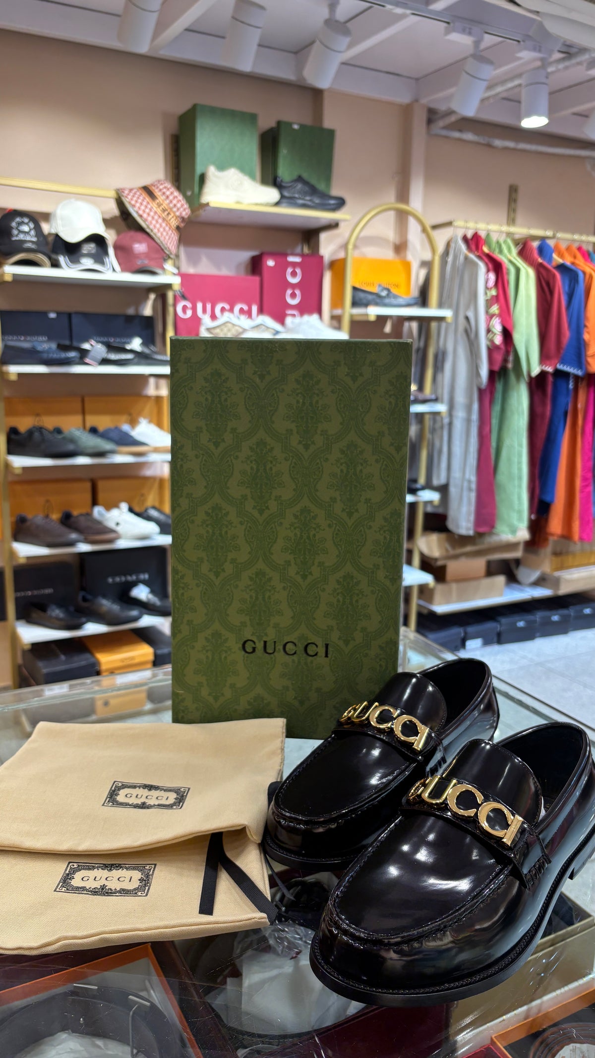 Glossy Black Gold-Buckle Loafers