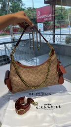 Signature monogram versatile bag with 3 slings