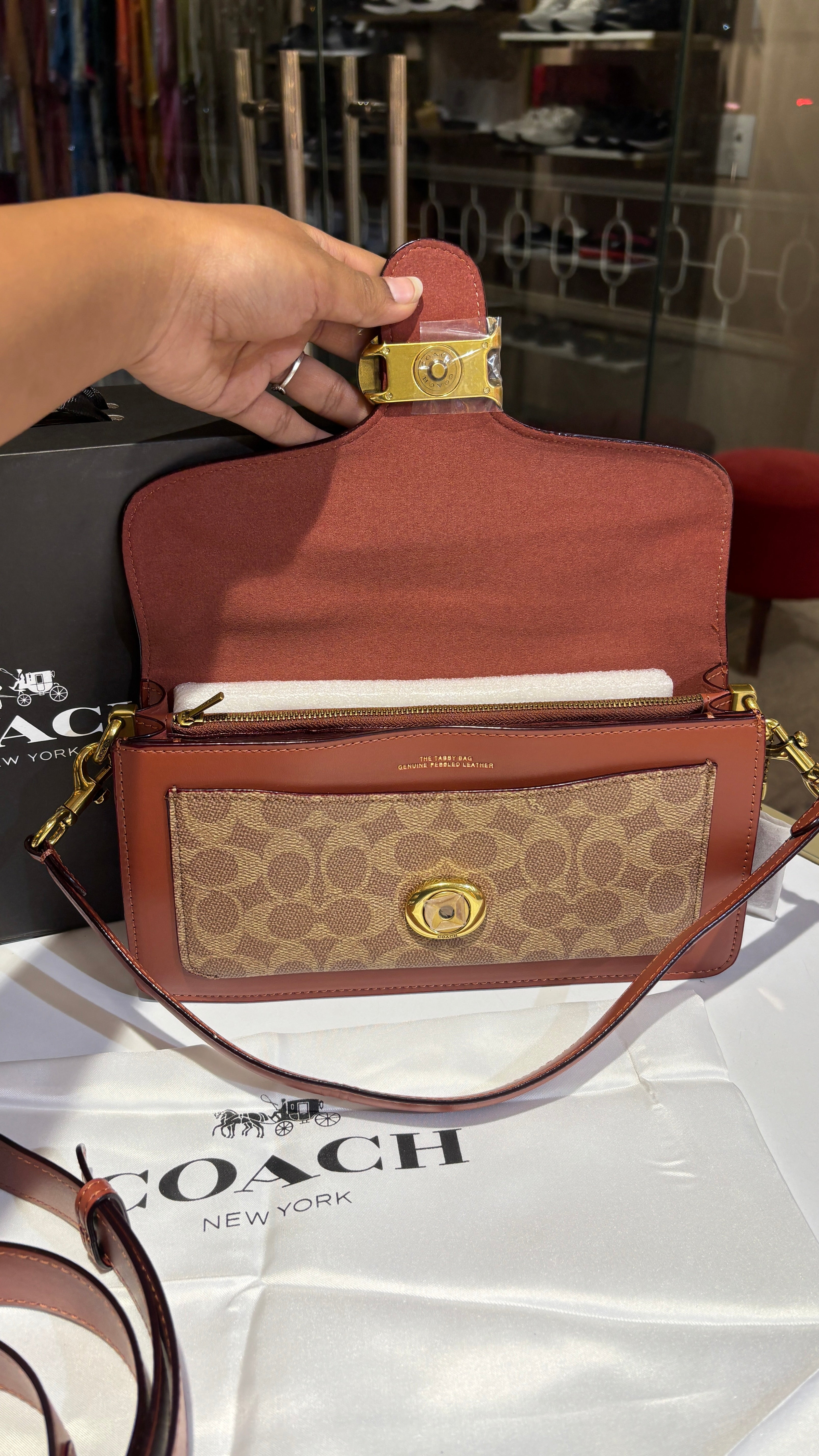 Signature monogram tan tabby bag