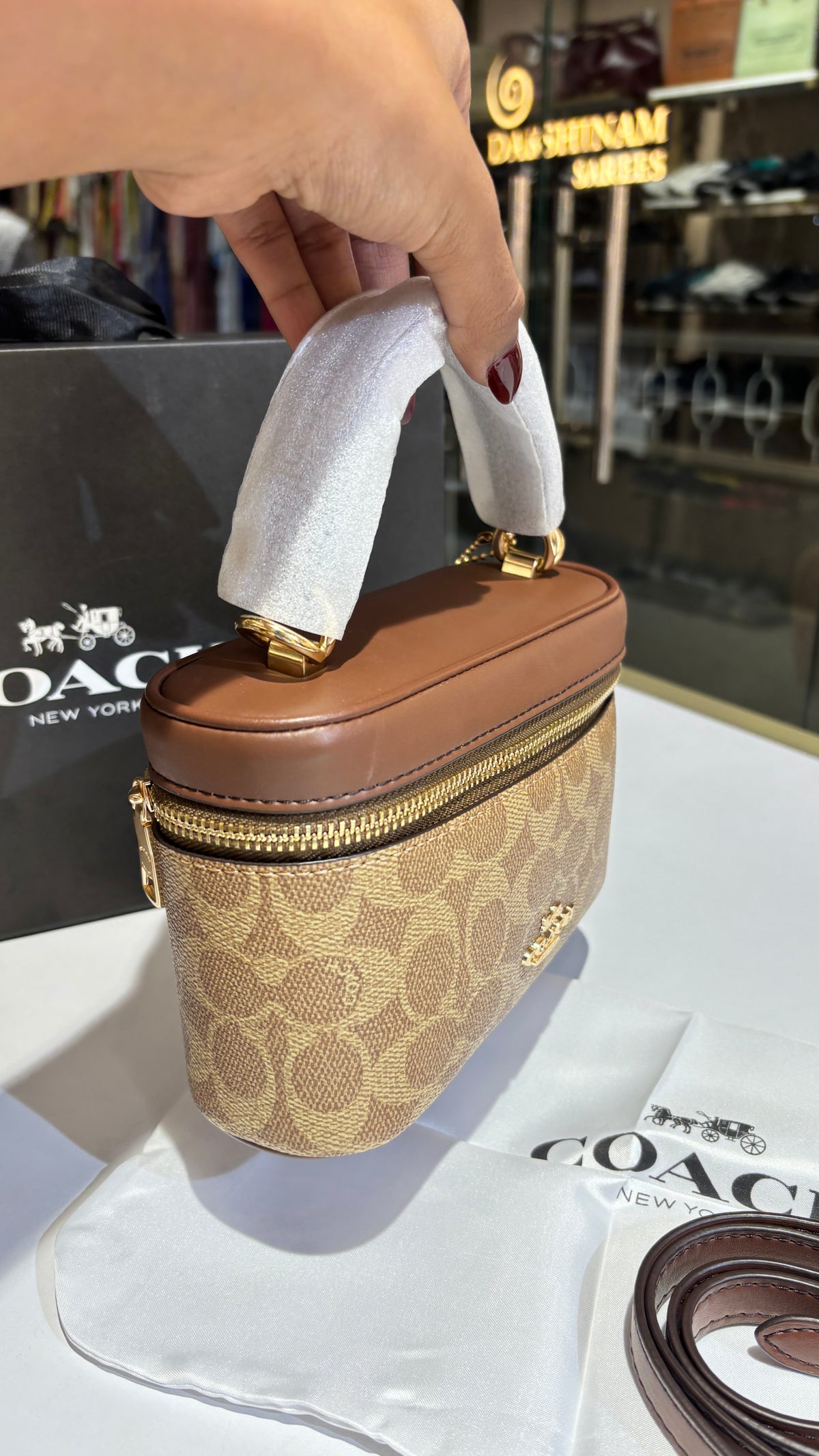 Signature Brown monogram vanity bag