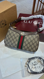 Signature monogram leather shoulder bag