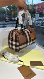 Signature Check Leather Barrel Bag