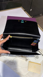 Quilted croc patterned sling bag