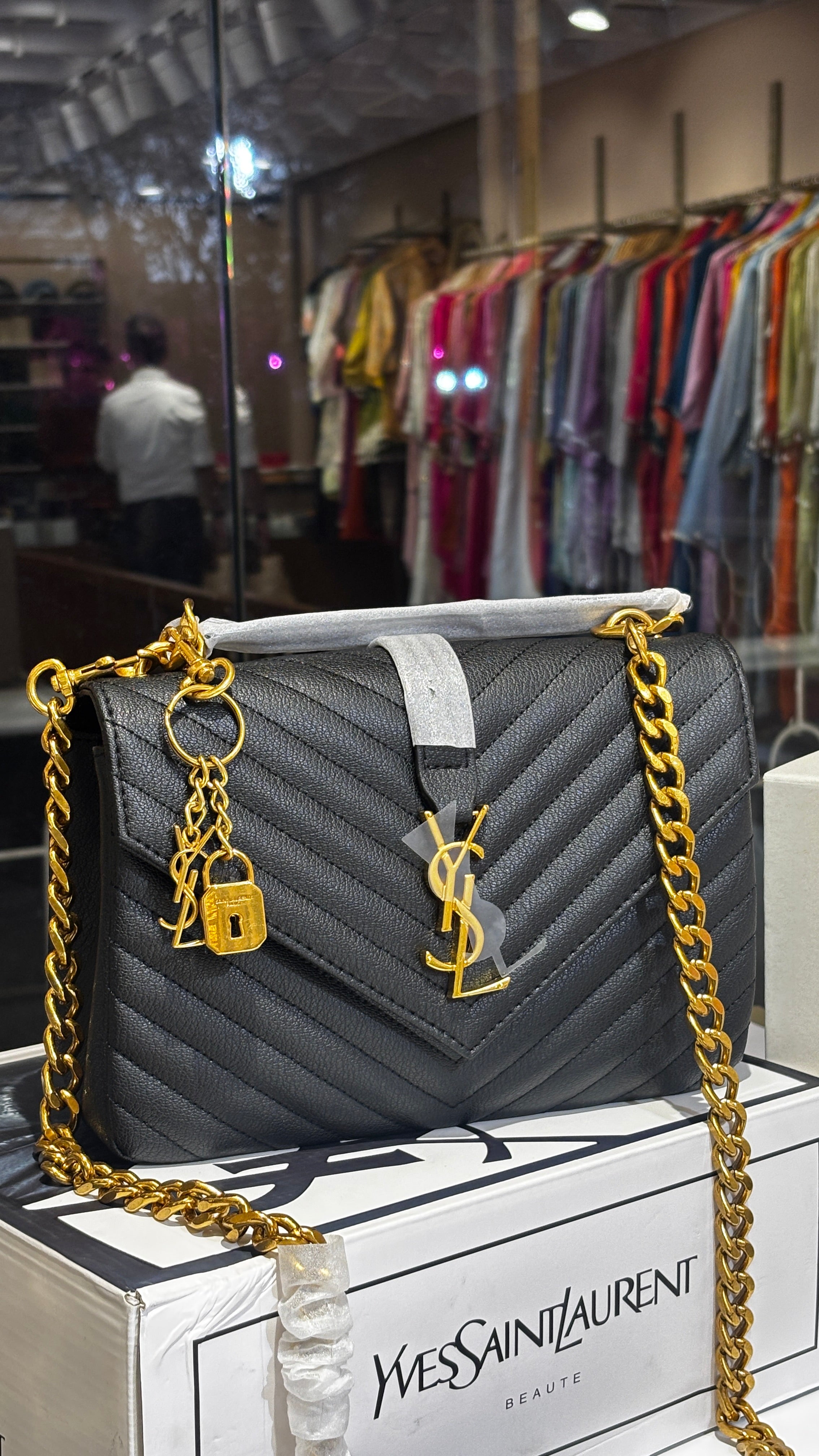 Gold Charm Accent Quilted Crossbody bag