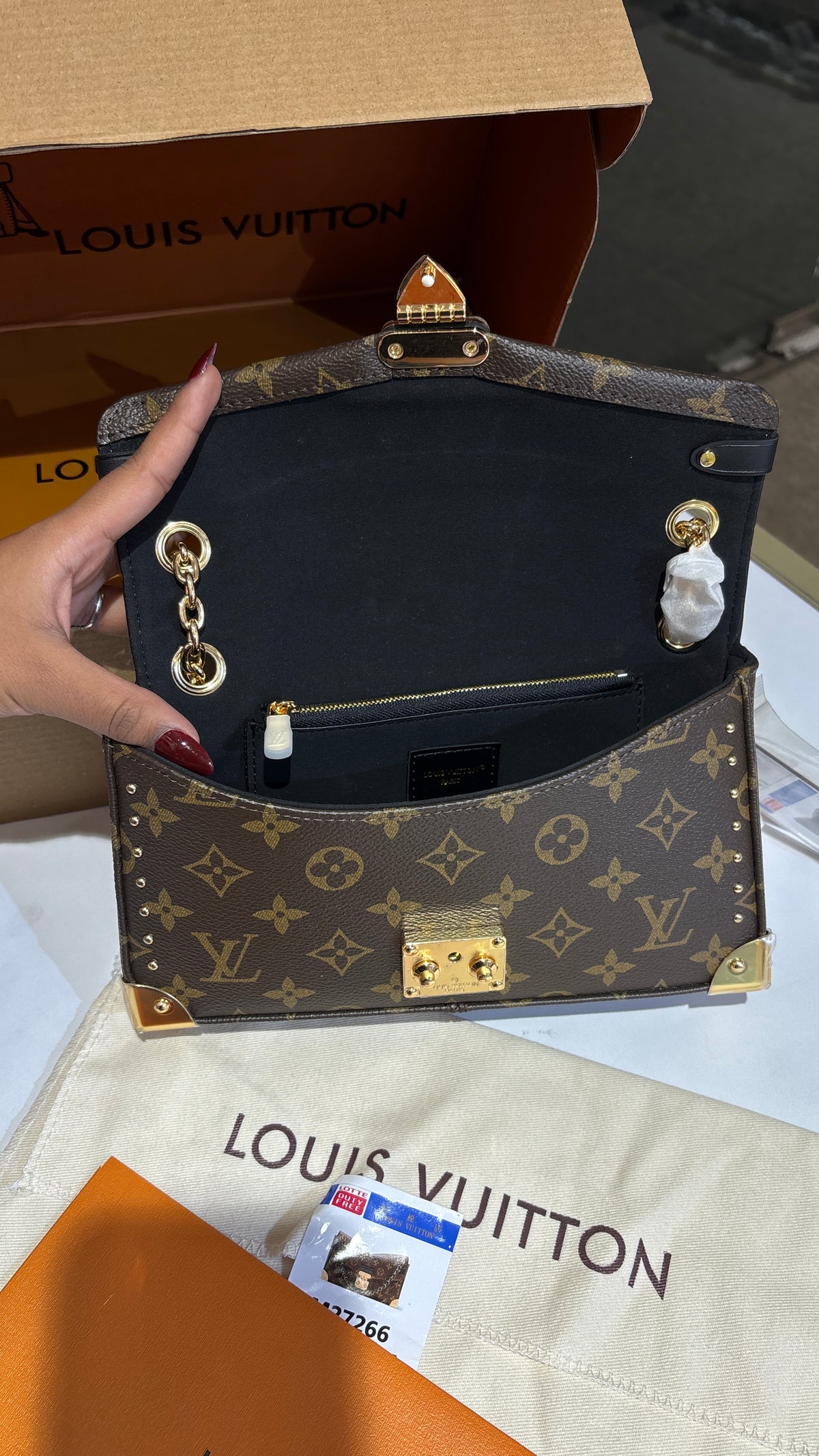 Signature monogram sling bag
