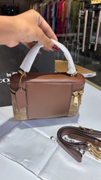 Signature Brown monogram vanity bag
