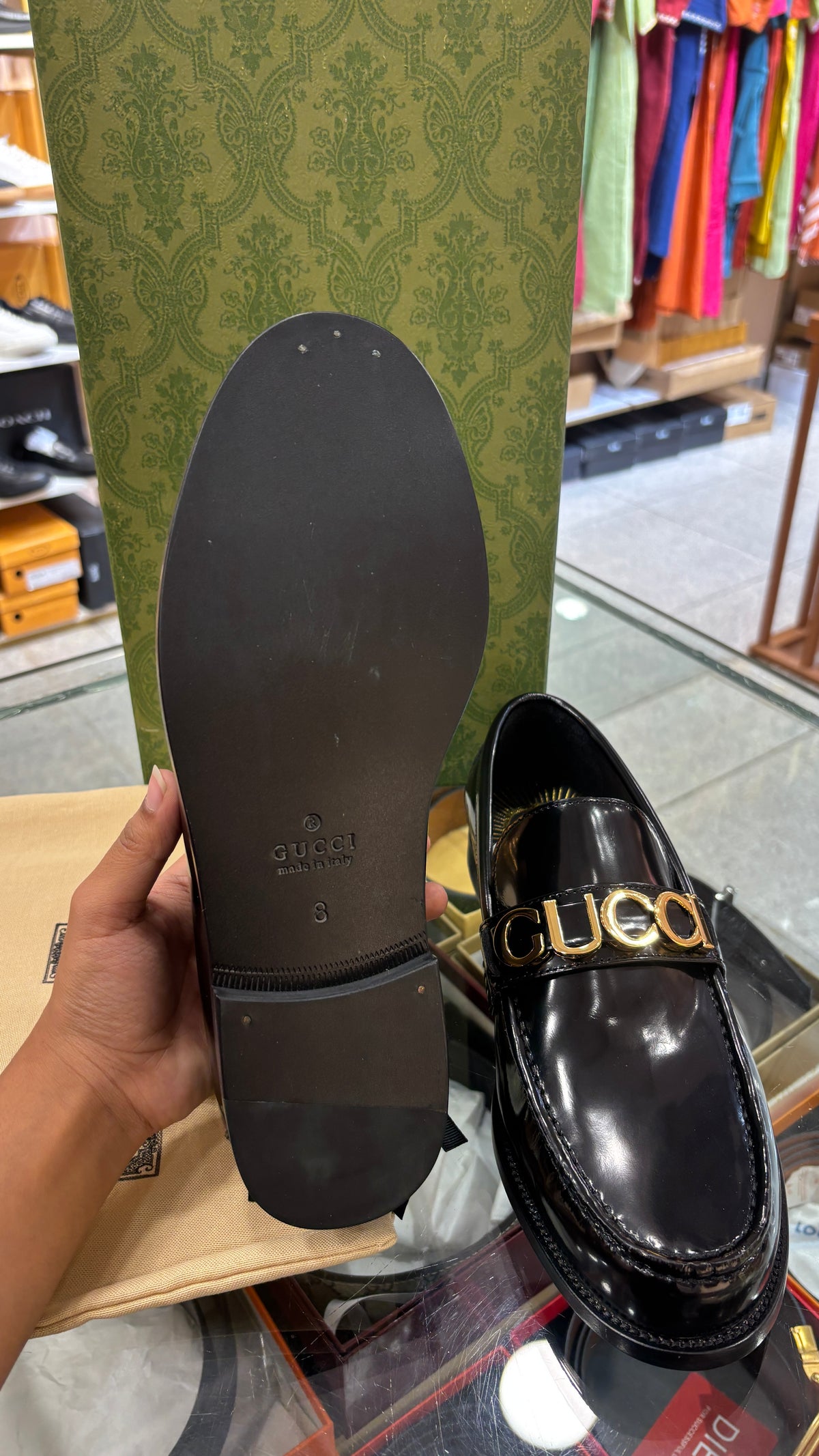 Glossy Black Gold-Buckle Loafers