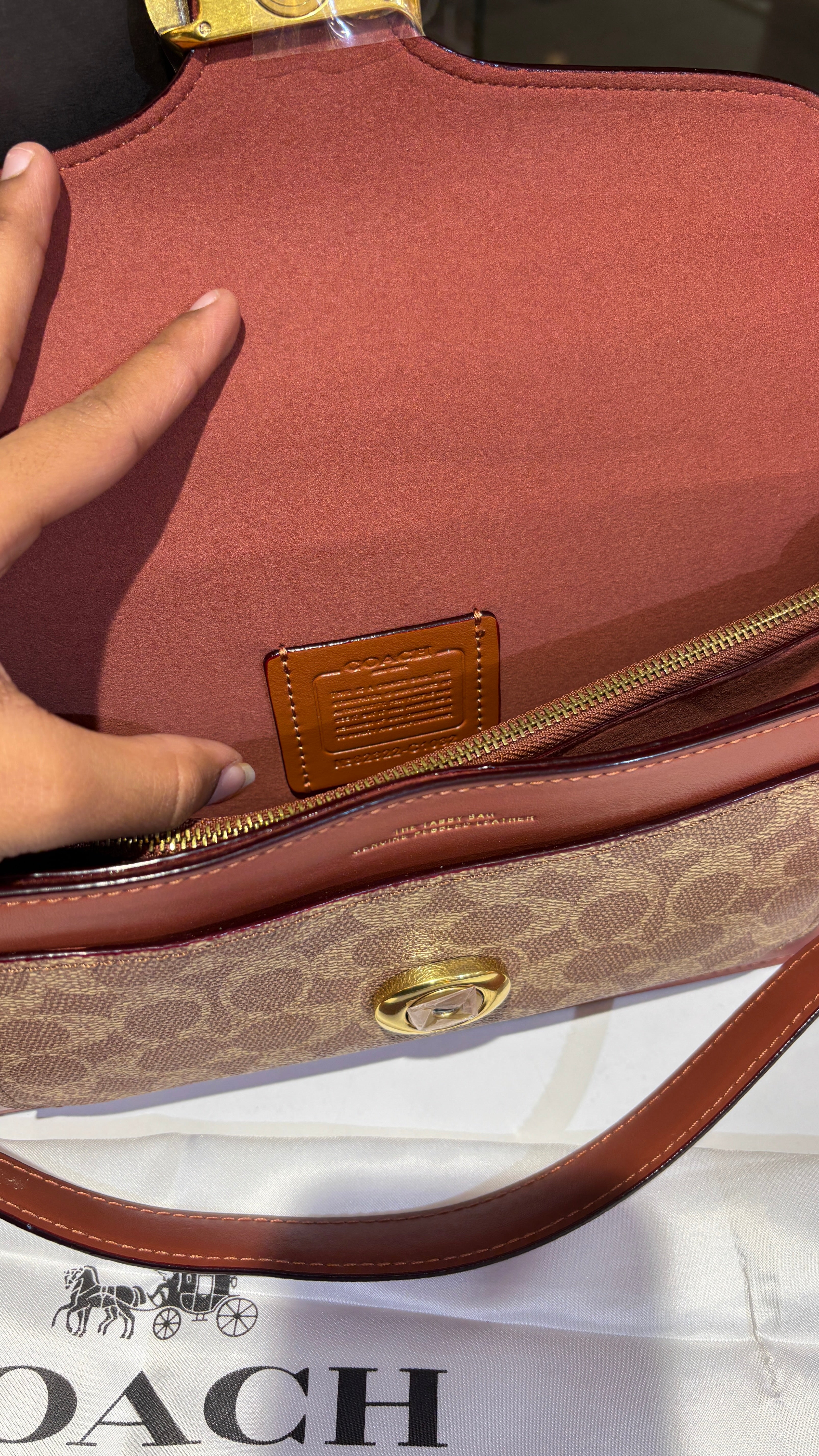 Signature monogram tan tabby bag