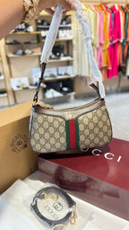 Signature monogram leather shoulder bag