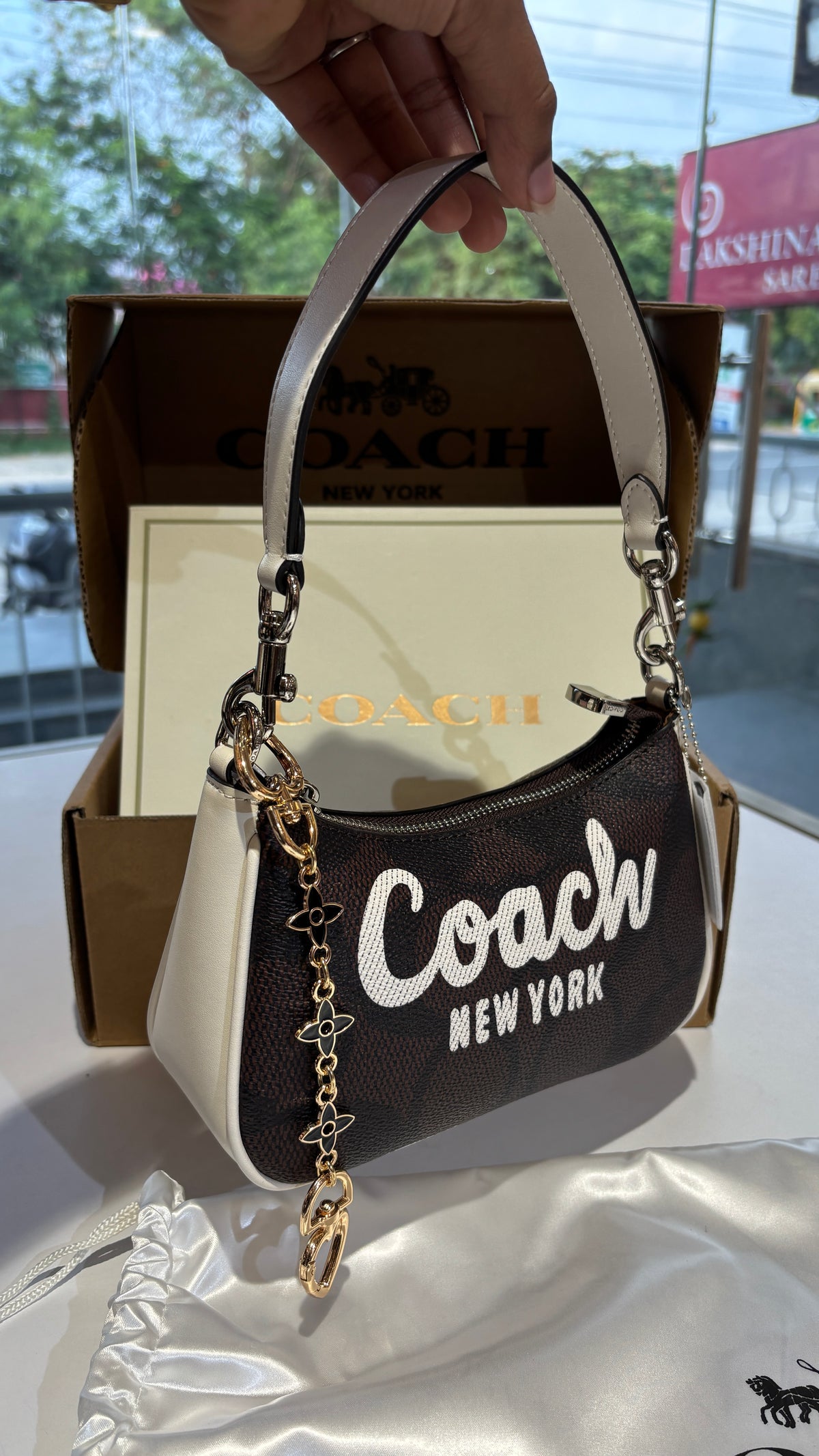 Classic brown monogram Shoulder bag with charm