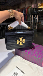 Quilted croc patterned sling bag