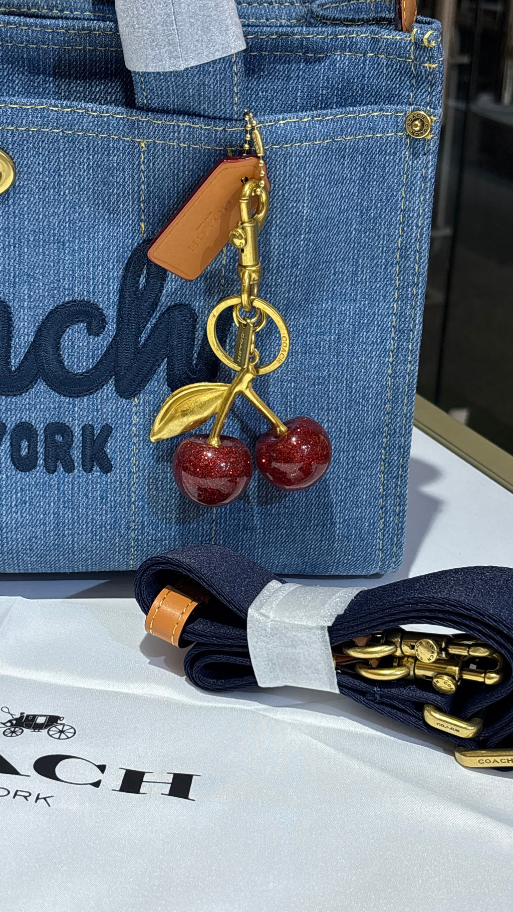 Structured denim bag with cherry charm