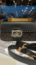 Structured monogram tabby bag with detachable straps