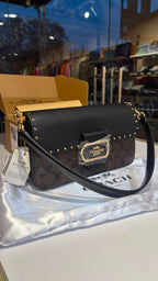 Structured monogram tabby bag with detachable straps