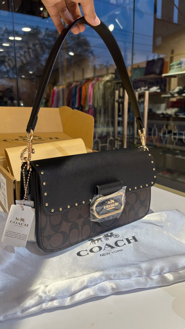 Structured monogram tabby bag with detachable straps