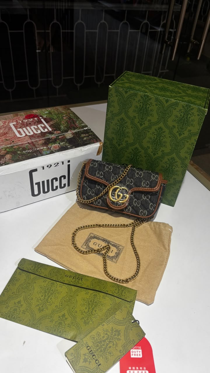 Mini monogram sling bag with detachable sling