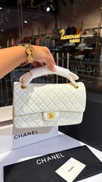 Quilted white sling bag