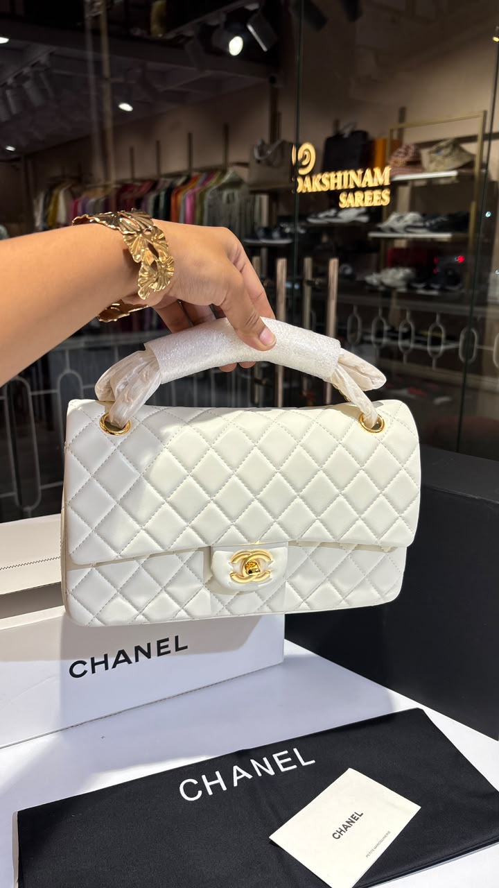 Quilted white sling bag