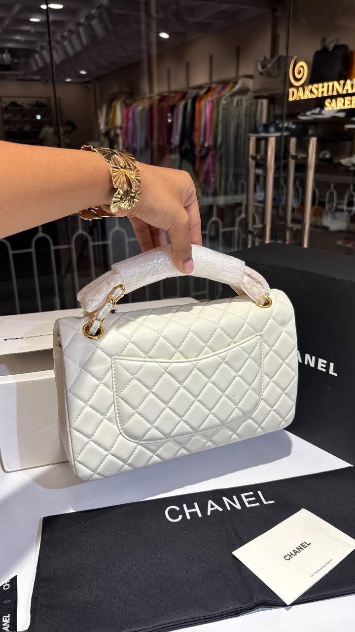 Quilted white sling bag