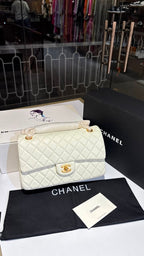Quilted white sling bag