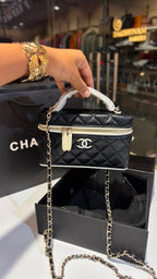 Quilted Top-Handle Vanity bag with Chain Strap
