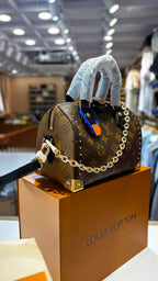 Monogram Top-Handle Mini Duffle Bag