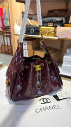 Classic Black Quilted Shoulder Tote with Gold Hardware