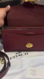 Structured tabby bag with detachable straps